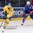MINSK, BELARUS - MAY 15: Sweden's Dick Axelsson #28 stickhandles the puck away from France's Antonin Manavian #4 during preliminary round action at the 2014 IIHF Ice Hockey World Championship. (Photo by Richard Wolowicz/HHOF-IIHF Images)

